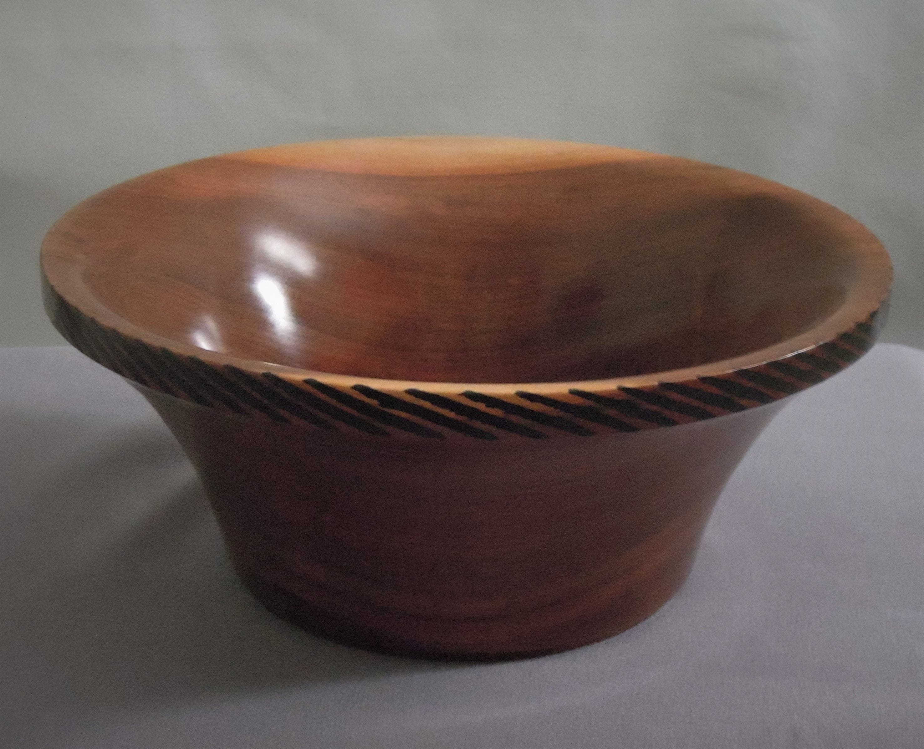 Made of Walnut
4"H X 8"Dia.
Signed and #145