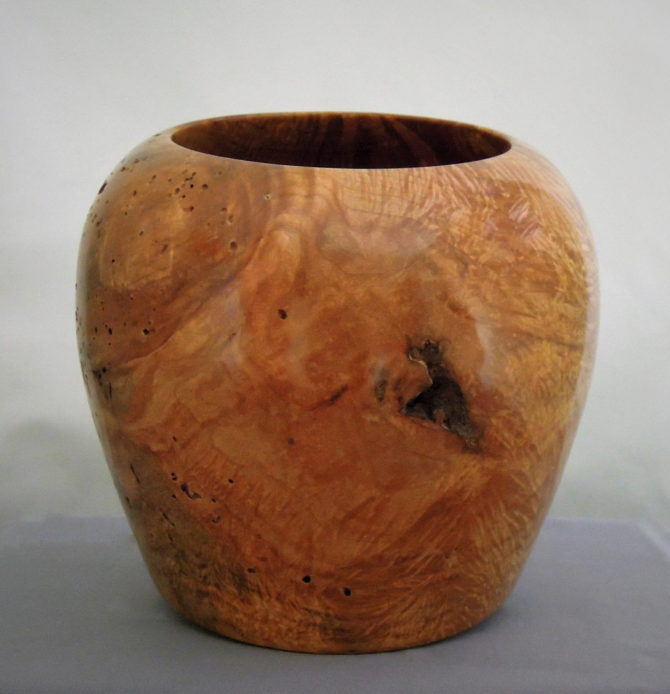 Made of Maple Burl
7.75"H X 7"Dia.
Signed and #114