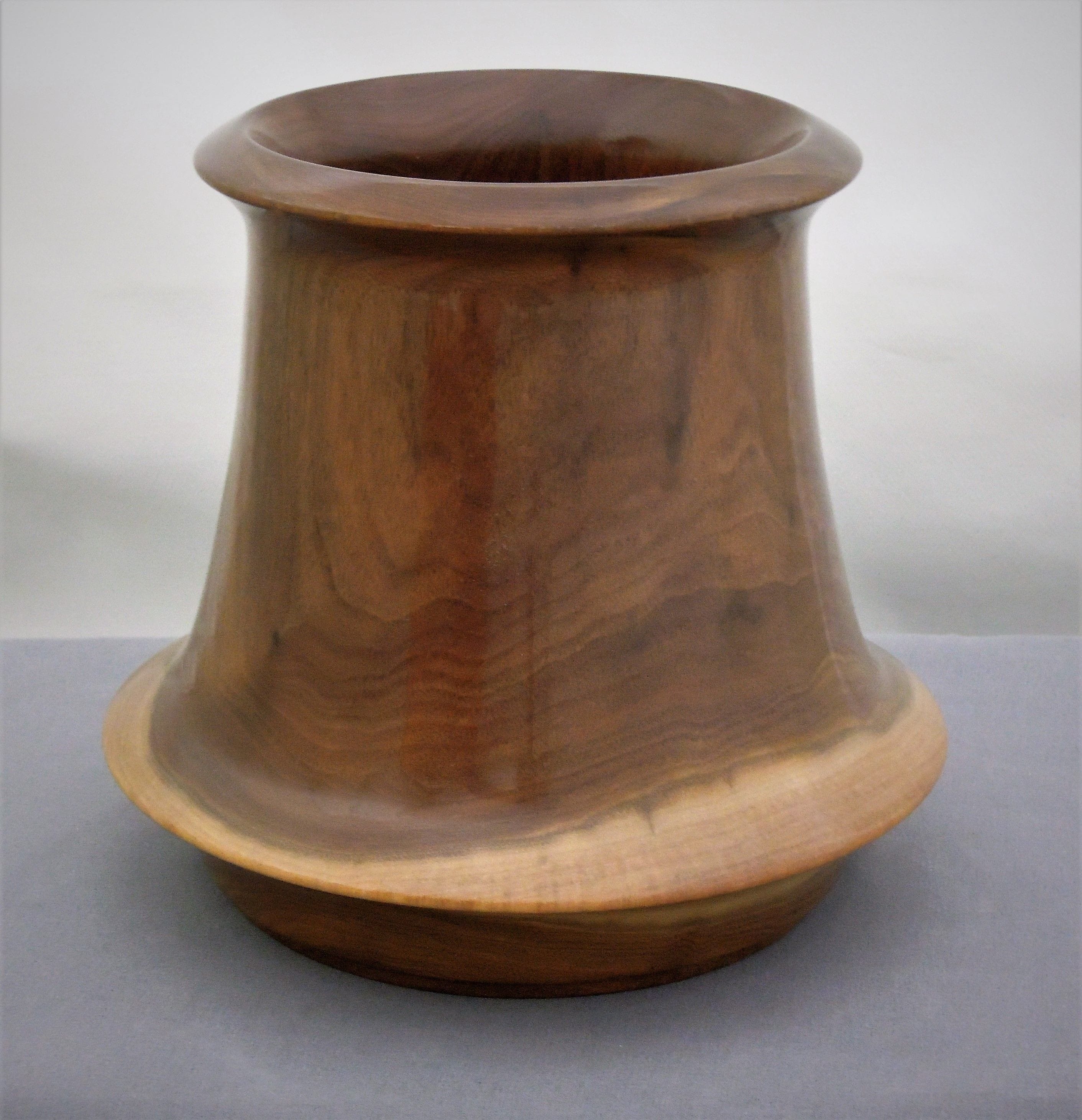 Made of Walnut
6.5"H X 7"Dia.
Signed and #142