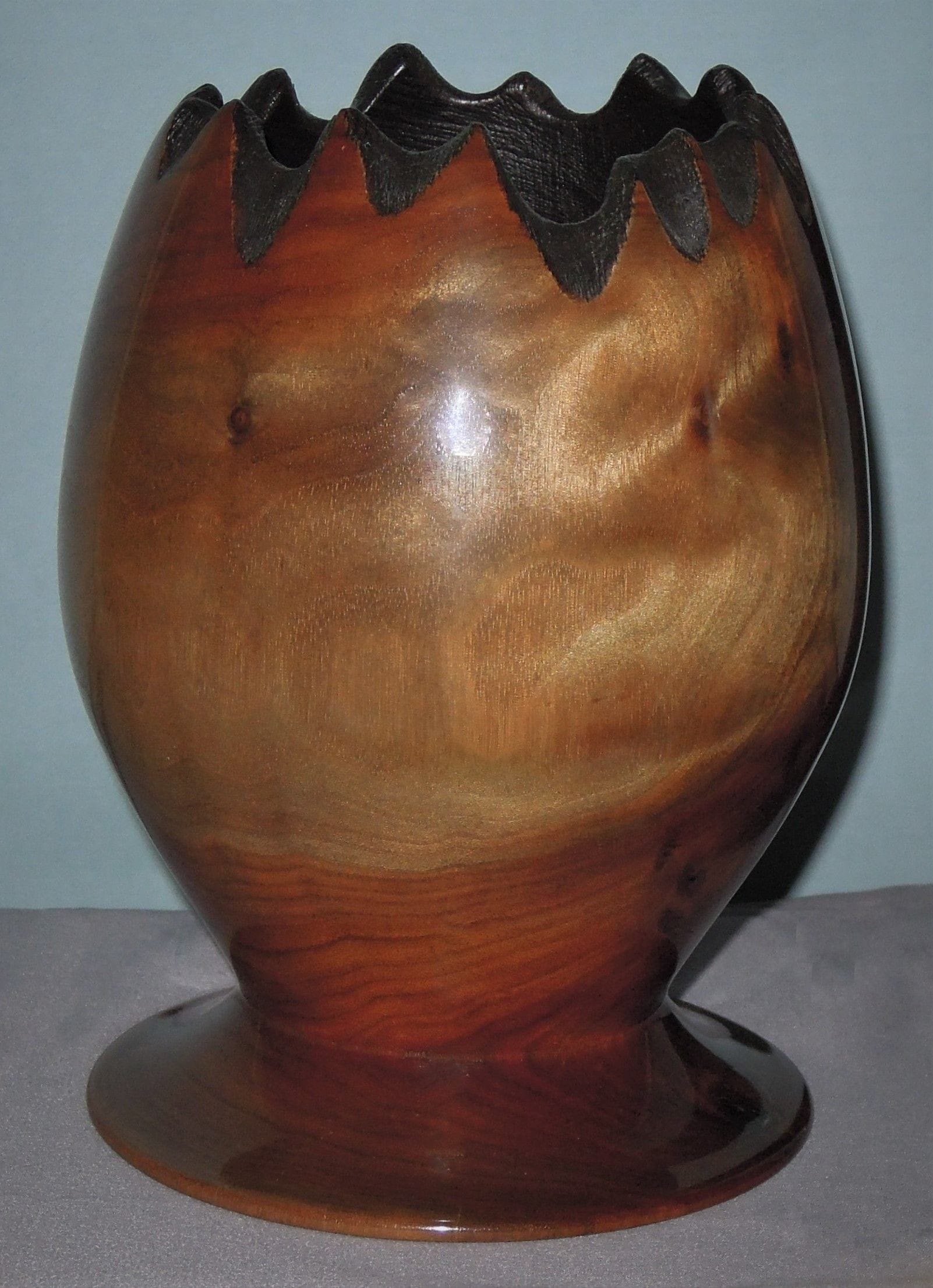 Made of Black Walnut
6.5"H X 5"Dia.
Signed and #137