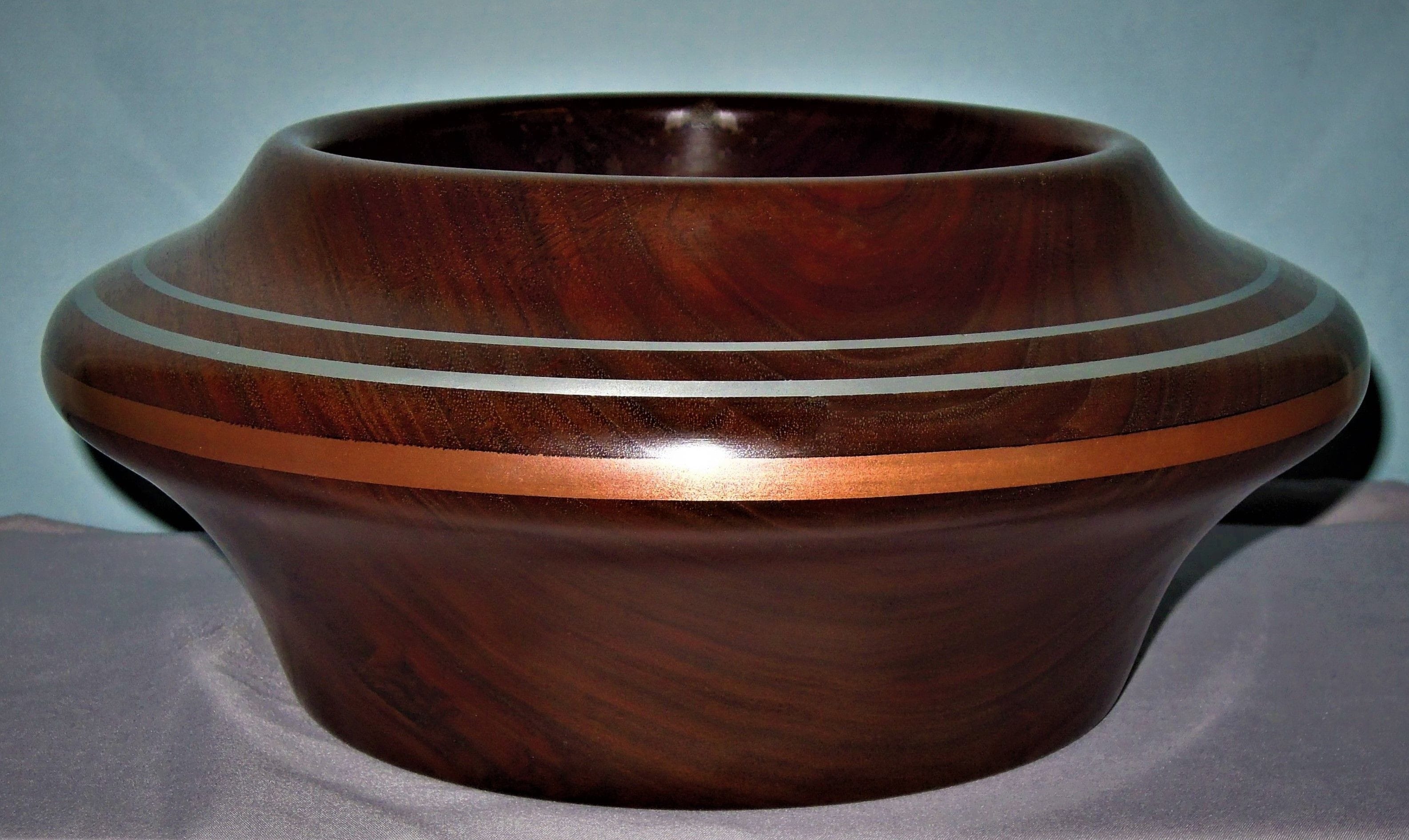 Made of English Walnut
5"H X 11"Dia.
Signed and #148